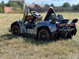 Lambo grey view of back with doors up 