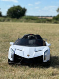 white lambo front view carbon fiber