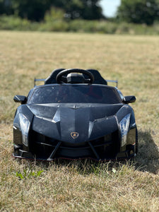 black lambo front showing drls 